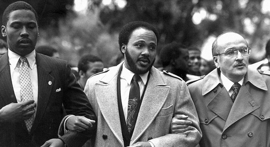 Martin Luther King III and Dean Florian Bartosic lead a march to the UC Davis School of Law, 1986