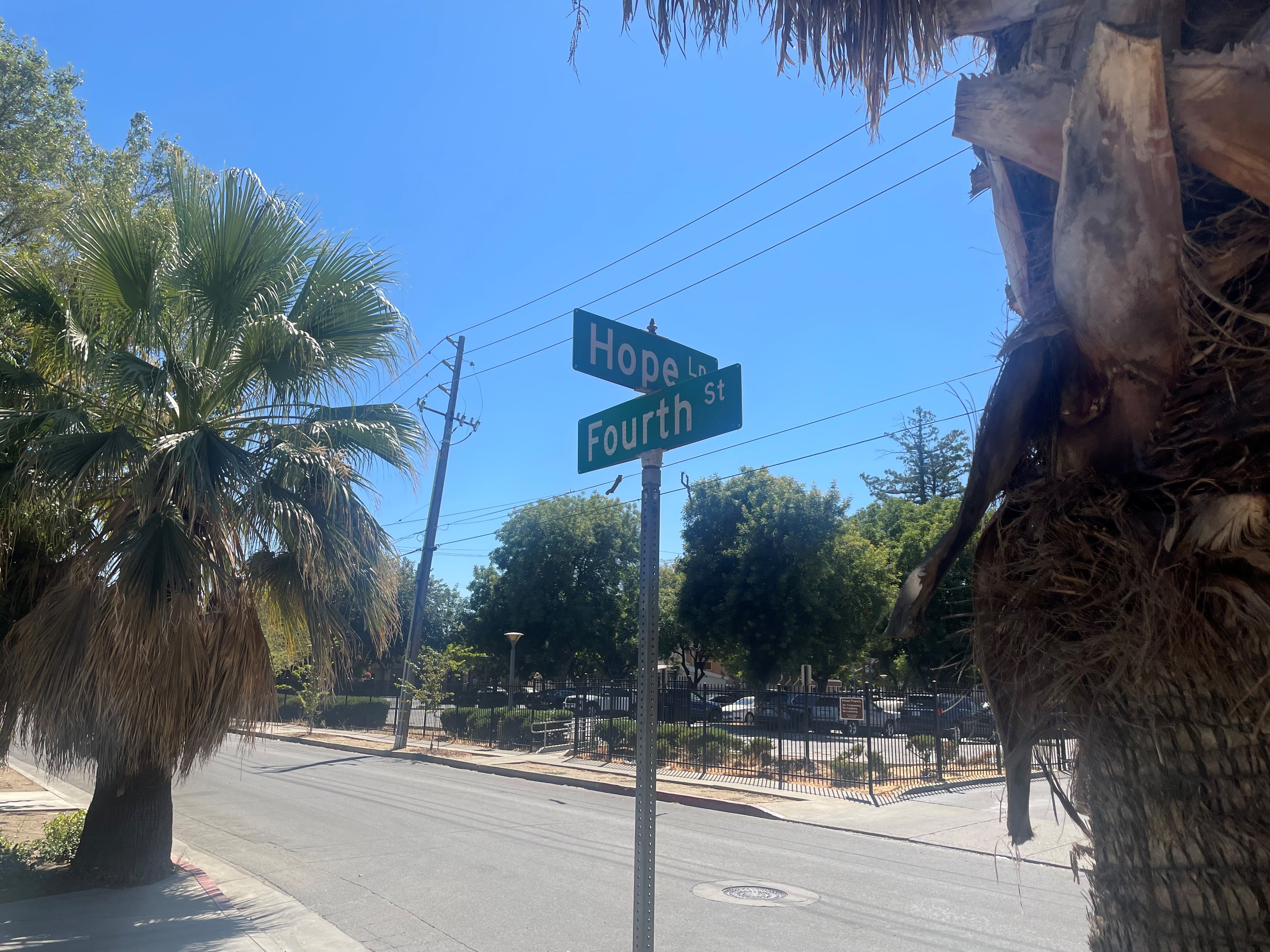 Two street signs in Woodland, California.
