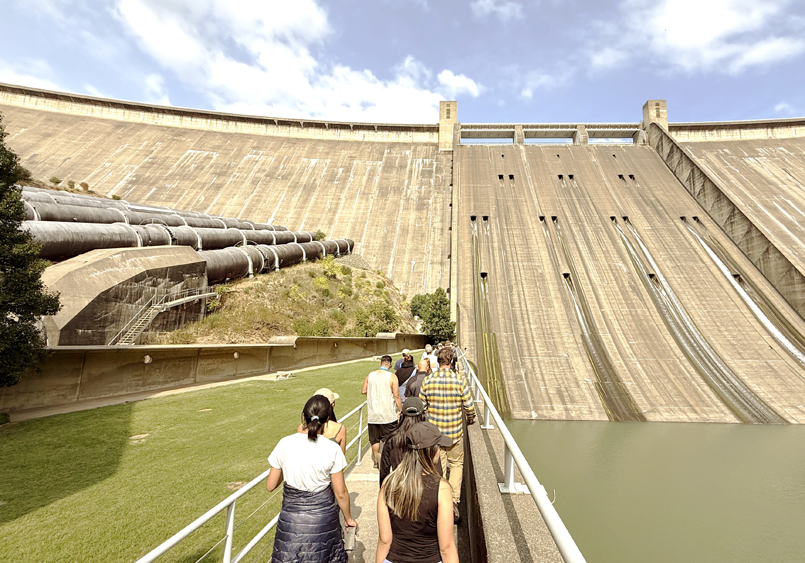 UC Davis Law students exploring a dam.