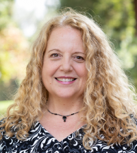 Emily Scivoletto headshot photo. 