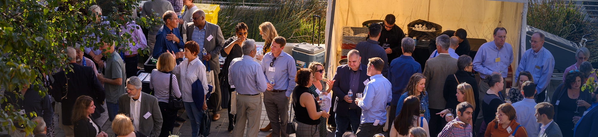 Banner image featuring Alumni at a Reunion